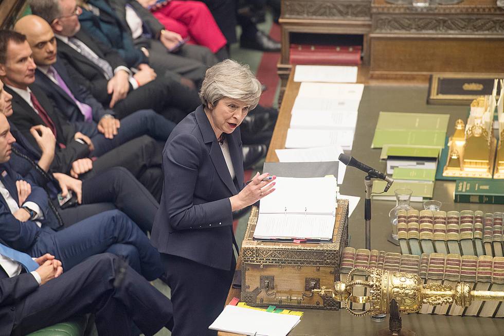 Britain's Prime Minister Theresa May speaks during Prime Minister's Questions in the House of Commons, London, Wednesday, Jan. 9, 2019.  The British government brought its little-loved Brexit deal back to Parliament on Wednesday, a month after postponing a vote on the agreement to stave off near-certain defeat. (Â©UK Parliament /Mark Duffy via AP)