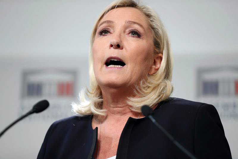 French far-right National Rally leader Marine Le Pen gives a press conference, at the National Assembly, in Paris, Monday, Oct. 7, 2019. Monday's debate is part of French President Emmanuel Macron's promise to confront the issue head-on during the second half of his presidency. (AP Photo/Thibault Camus)