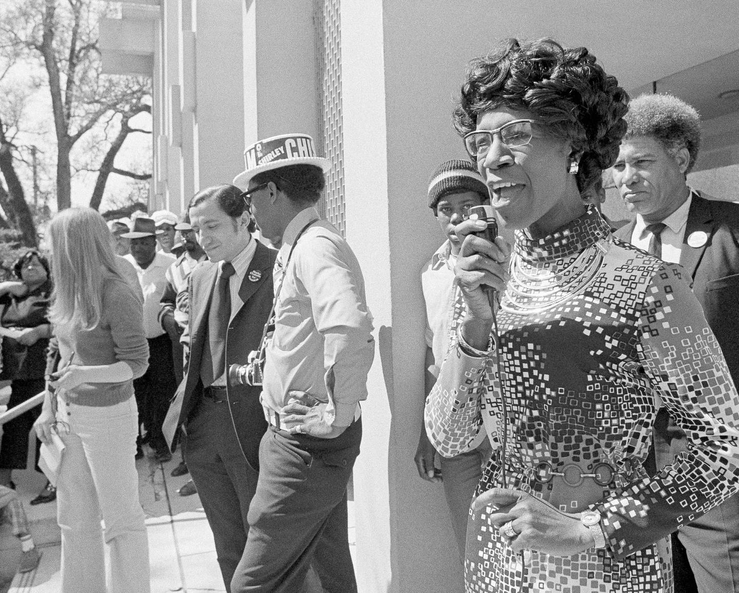 FILE - In this March 11, 1972, file photo, Rep. Shirley Chisholm, D-NY, addresses a crowd of several hundred on the steps of the Jackson County court house in Marianna, Fla. Chisholm was stumping the panhandle of north Florida seeking votes in Florida's presidential primary. Running as a Democrat, Chisholm became the first black major-party presidential candidate, competing in 12 state primaries and winning 28 delegates. (AP Photo/Bill Hudson, File)