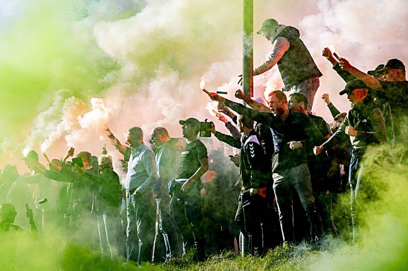 epa07399198 Fans of Feyenoord gather at the team's training ground to support the players during their training session ahead the Dutch Cup semifinal soccer match against Ajax Amsterdam, in Rotterdam, The Netherlands, 26 February 2019.  EPA/ROBIN UTRECHT
