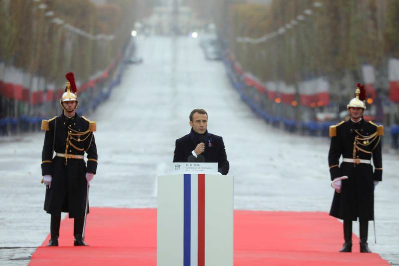 French President Emmanuel Macron delivers a speech during a ceremony at the Arc de Triomphe in Paris as part of the commemorations marking the 100th anniversary of the 11 November 1918 armistice, ending World War I, Sunday, Nov. 11, 2018. (Ludovic Marin/Pool Photo via AP)