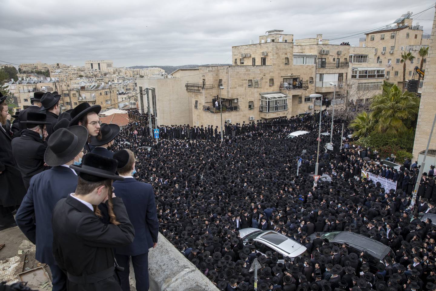 In this Sunday, Jan. 31, 2021, file photo, Thousands of ultra-Orthodox Jews participate in funeral for prominent rabbi Meshulam Soloveitchik, during a nationwide lockdown to curb the spread of the virus. in Jerusalem. Along with the impressive speed of its vaccination campaign, Israel is discovering its limits. Even after inoculating over one-third of its population, the country remains stuck in a tight lockdown as it grapples with imported variants of the virus. (AP Photo/Ariel Schalit, FILE)