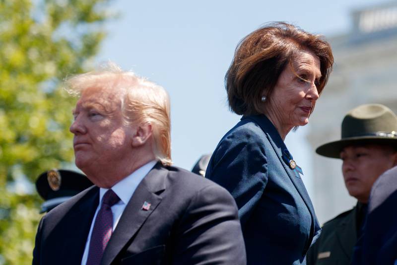 President Donald Trump and Speaker of the House Nancy Pelosi of Calif., attend the 38th Annual National Peace Officers' Memorial Service at the U.S. Capitol, Wednesday, May 15, 2019, in Washington. Pelosi said Wednesday that the U.S. must avoid war with Iran and she warned the White House has ?Äúno business?Äù moving toward a Middle East confrontation without approval from Congress.  (AP Photo/Evan Vucci)