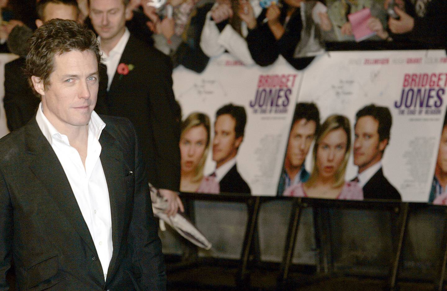 Actor Hugh Grant star of the film 'Bridget Jones: The Edge of Reason' poses for  photographers outside  the Odeon Leicester Square in London before the premiere of the film Tuesday Nov. 9, 2004. (AP Photo/Adam Butler)