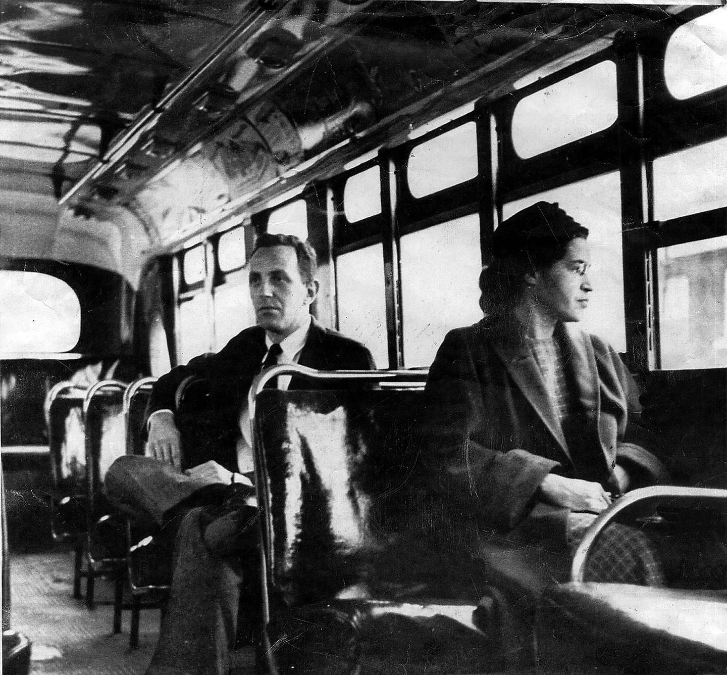 File - This undated file photo shows Rosa Parks riding on the Montgomery Area Transit System bus in Montgomery, Ala. Parks refused to give up her seat on a Montgomery bus Dec. 1, 1955, and ignited the boycott that led to a federal court ruling against segregation in public transportation. The 60th anniversary of a bus boycott is widely credited with helping spark the modern civil rights movement. (AP Photo/Daily Advertiser, File)