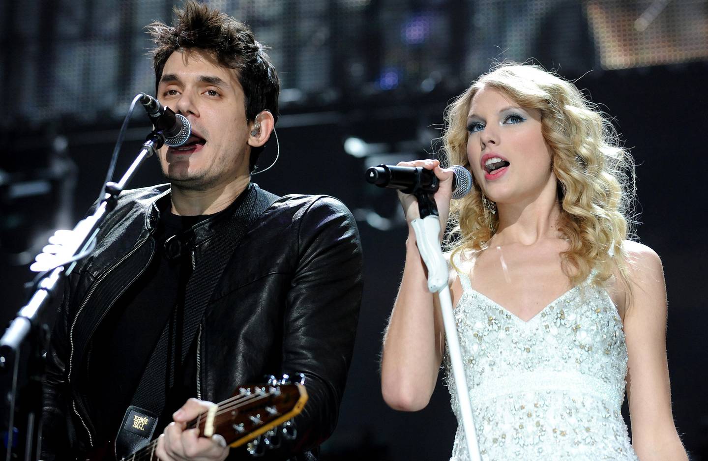 Musician John Mayer and singer Taylor Swift perform together at the 2009 Z100 Jingle Ball at Madison Square Garden in New York on Friday, Dec. 11, 2009. (AP Photo/Evan Agostini)